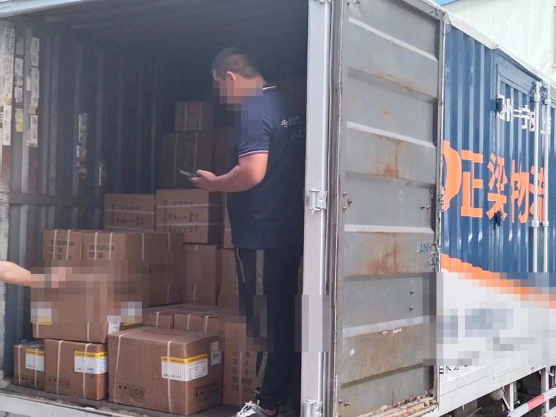 Cartons being loaded into a shipping container